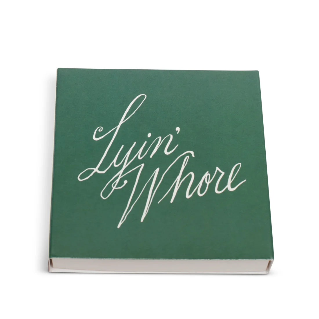 Green square matchbox from above with Lyin' Whore in white cursive script