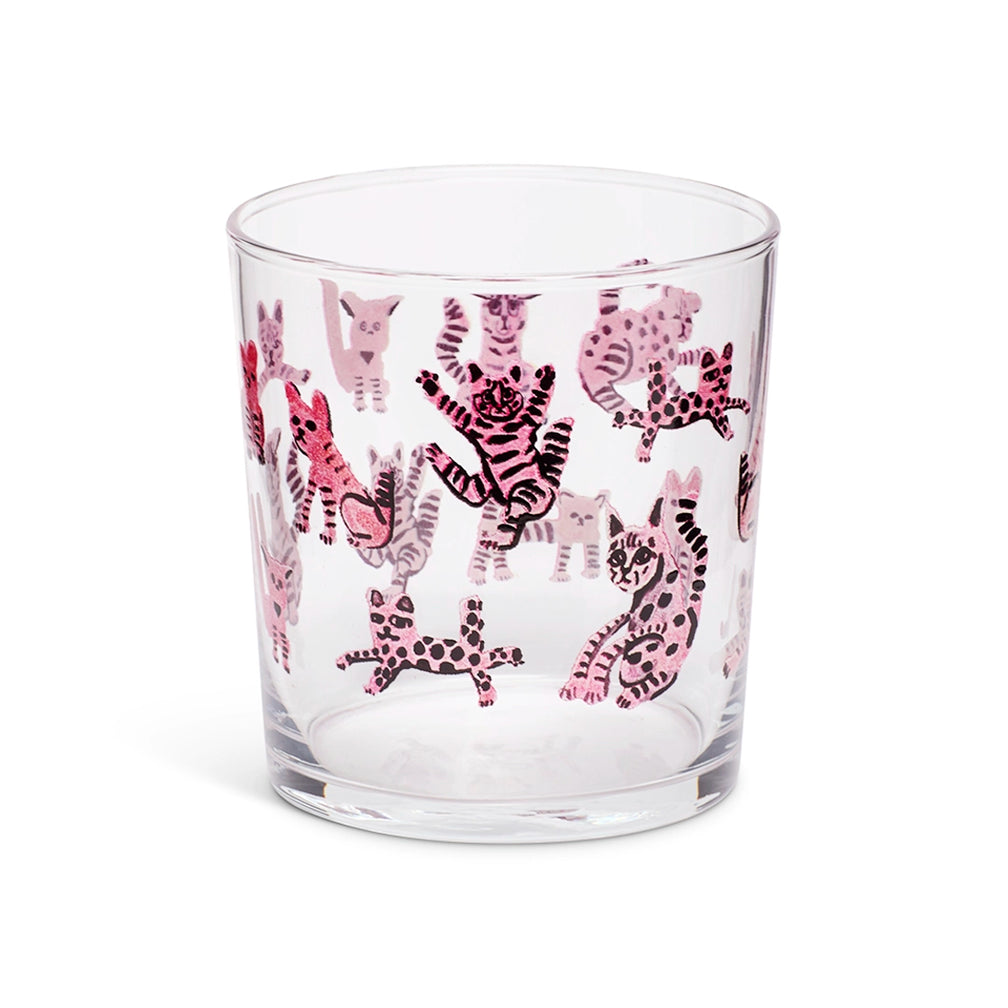 Pink cats lowball glass at a slight angle showing the rim