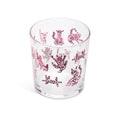 Pink cats lowball glass from above showing the cats through the glass