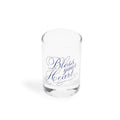 Clear shot glass with navy script reading Bless your Heart, at a slight angle