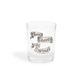 Clear shot glass with Three Sheets to the Wind lettered on tan scroll banners