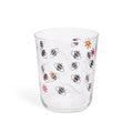 Bees juice glass at a slight angle showing the rim