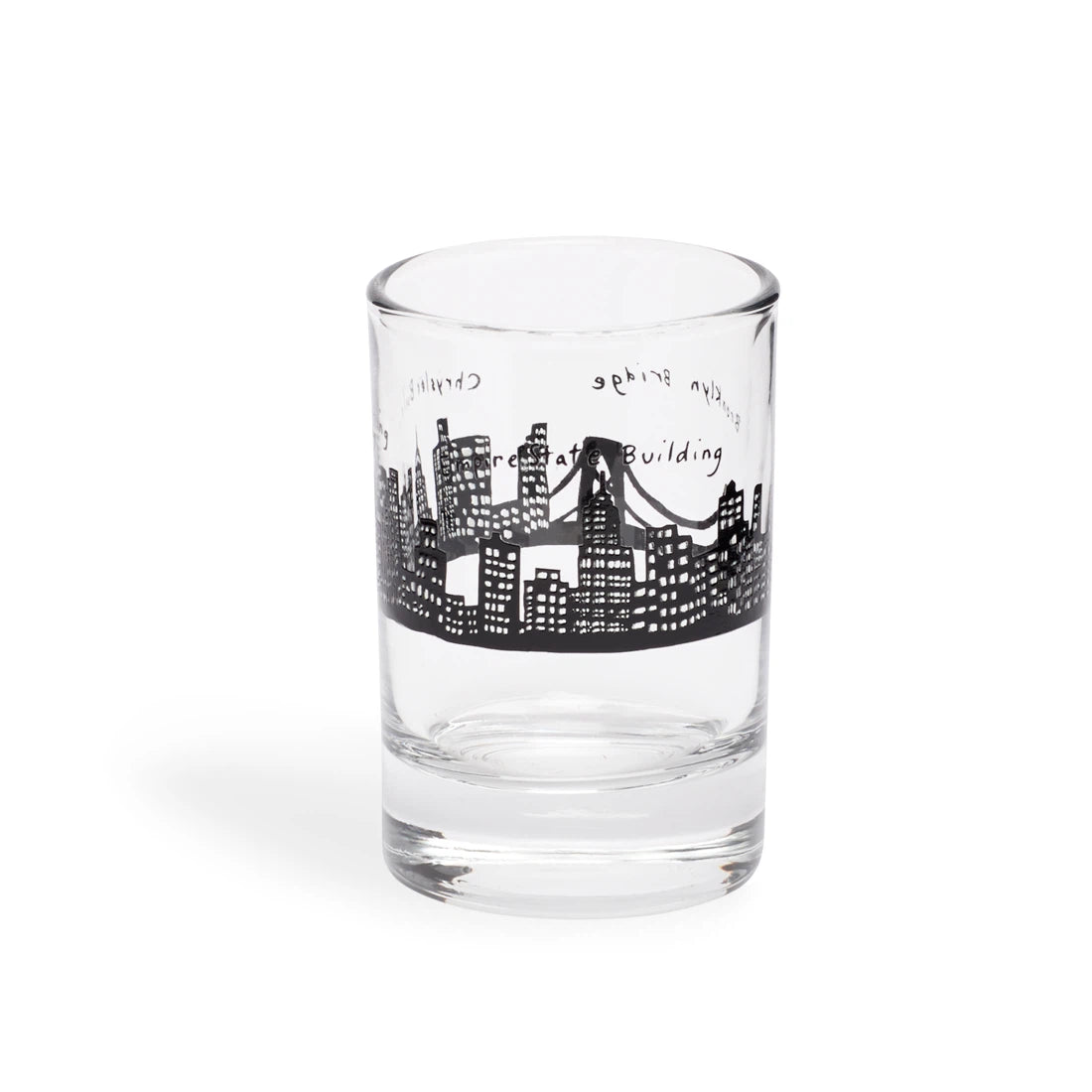 Clear shot glass with a black hand-drawn NYC skyline and Brooklyn Bridge band, side view