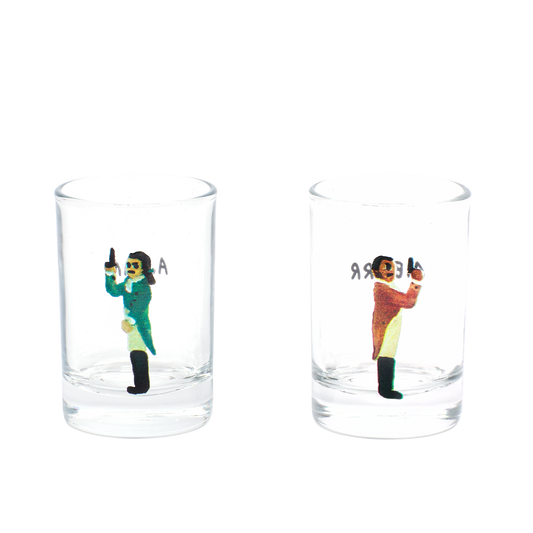 Hamilton - Dueling Shot Glass Set - Boxed compact glassware, with a crisp silhouette and decorative details that stand out on the table; a playful, space-saving piece for shots, tasting pours, or bar-cart display. Primary product view highlights the overall design and proportions.