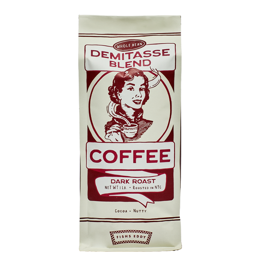 Coffee bag with vintage design featuring a woman holding a cup of coffee on a white background