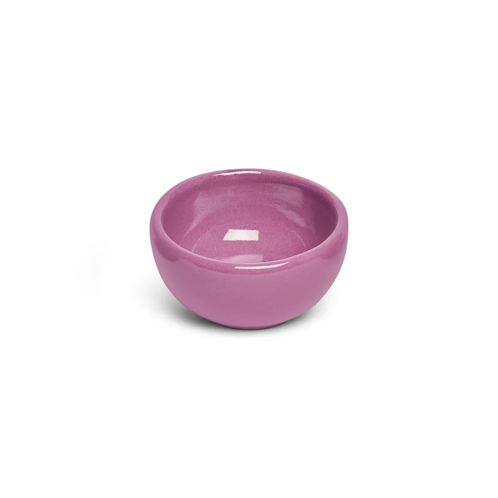 Small mauve orchid ceramic nut bowl from above showing the glossy interior