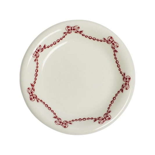 Ribbons Mini Plate tableware, with a clean, polished finish and distinctive shape or artwork; a useful size for meals, appetizers, desserts, snacks, or layered place settings. Primary product view highlights the overall design and proportions.