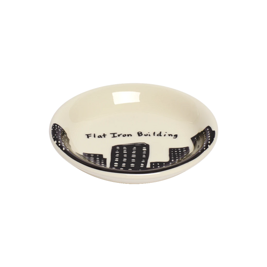 212 Skyline - Flat Iron Butter Pad serving and catchall piece, with a clean, polished finish and distinctive shape or artwork; useful for snacks and small bites, or for organizing jewelry, keys, and countertop essentials. Alternate product view shows more of the shape, finish, and design details.