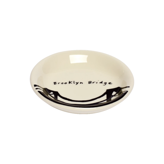 212 Skyline - Brooklyn Bridge Butter Pad serving and catchall piece, with a clean, polished finish and distinctive shape or artwork; useful for snacks and small bites, or for organizing jewelry, keys, and countertop essentials.