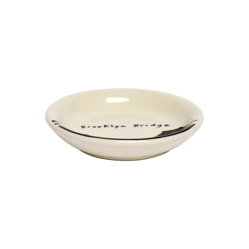 212 Skyline - Brooklyn Bridge Butter Pad serving and catchall piece, with a clean, polished finish and distinctive shape or artwork; useful for snacks and small bites, or for organizing jewelry, keys, and countertop essentials. Additional view helps show the profile, scale, and decorative details.