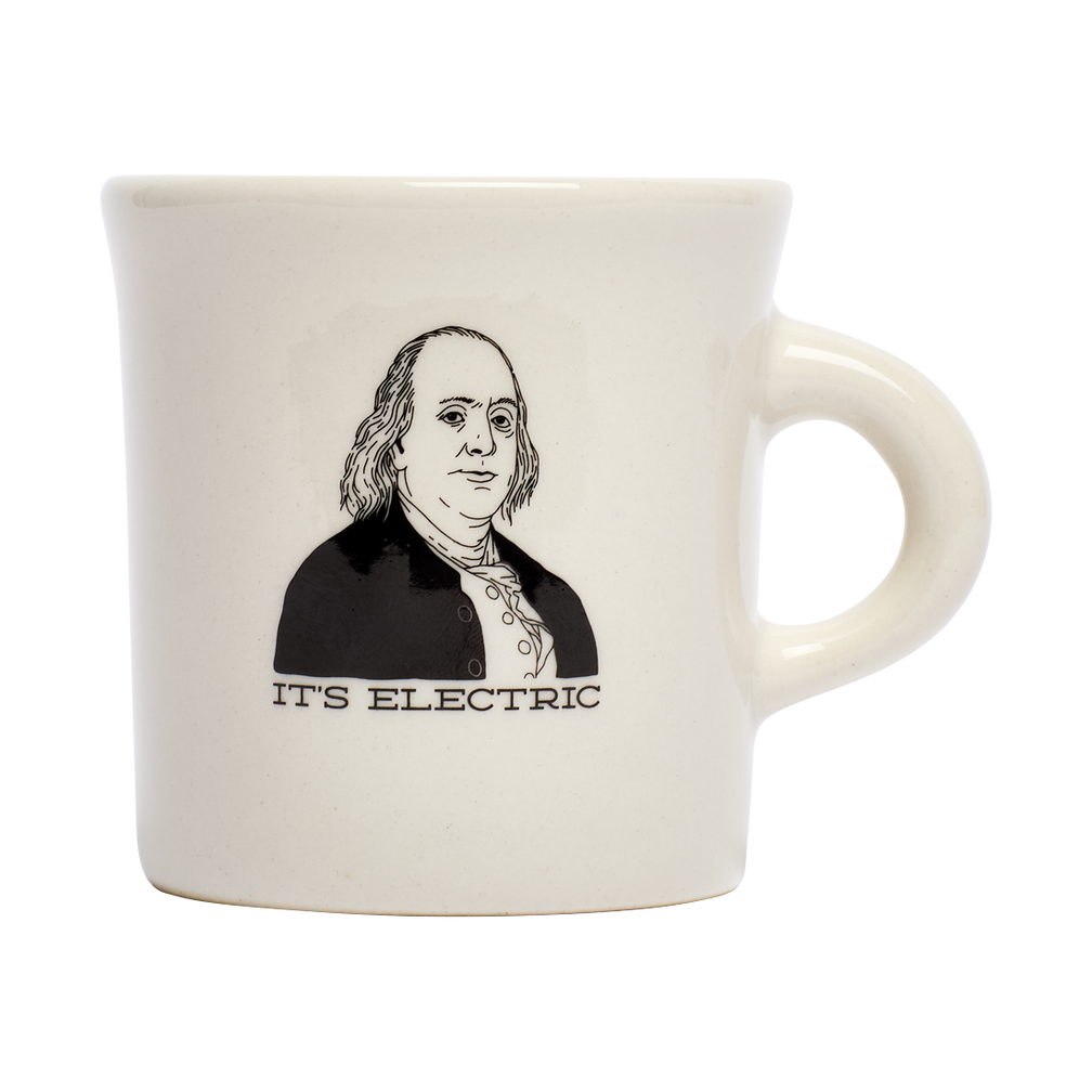 Its Electric Mug ceramic drinkware, with a clean, polished finish and distinctive shape or artwork; a comfortable everyday choice for coffee, tea, cocoa, or desk-side sipping. Primary product view highlights the overall design and proportions.