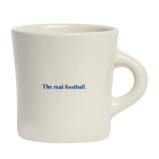 Soccer Mug ceramic drinkware, with a clean, polished finish and distinctive shape or artwork; a comfortable everyday choice for coffee, tea, cocoa, or desk-side sipping. Alternate product view shows more of the shape, finish, and design details.