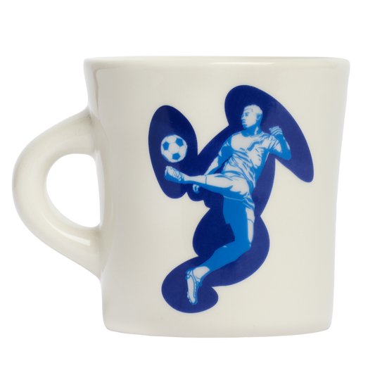 Soccer Mug ceramic drinkware, with a clean, polished finish and distinctive shape or artwork; a comfortable everyday choice for coffee, tea, cocoa, or desk-side sipping. Primary product view highlights the overall design and proportions.