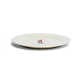 Side view of Rise Up ceramic dinner plate.