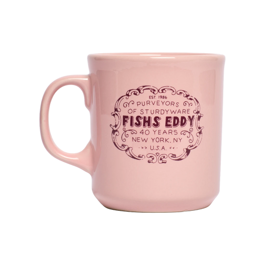 FE 40th Anniversary Mug - Pink ceramic drinkware, with a clean, polished finish and distinctive shape or artwork; a comfortable everyday choice for coffee, tea, cocoa, or desk-side sipping. Primary product view highlights the overall design and proportions.
