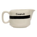 Cream pitcher with 'Creamuh' text on a white background