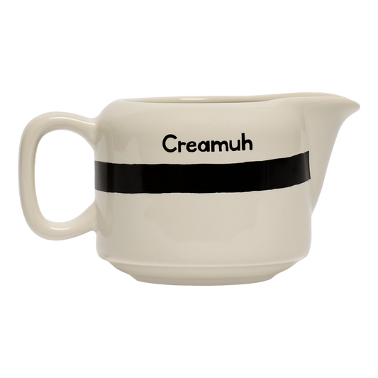 Cream pitcher with 'Creamuh' text on a white background