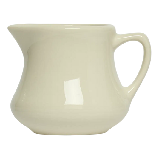 Diner Whites - Creamer pouring vessel, with a clean, polished finish and distinctive shape or artwork; handy for cream, milk, sauces, small-batch drinks, or as a compact tabletop accent. Primary product view highlights the overall design and proportions.