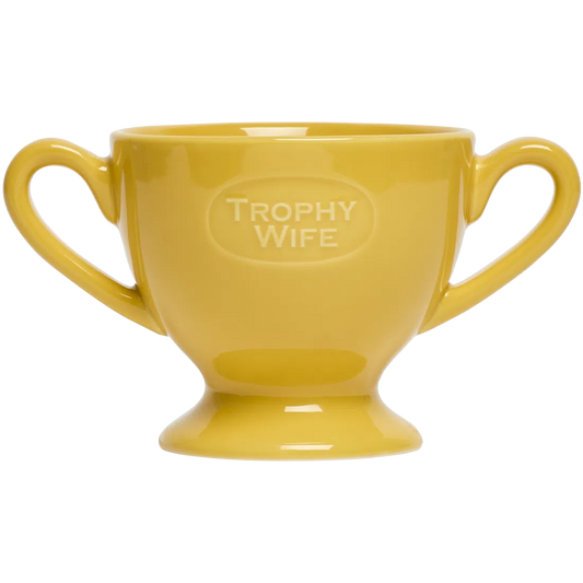 Item - Fishs Eddy Trophy Wife Mug ceramic drinkware, with a clean, polished finish and distinctive shape or artwork; a comfortable everyday choice for coffee, tea, cocoa, or desk-side sipping. Primary product view highlights the overall design and proportions.