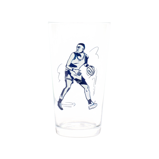 Basketball Pint Glass generous glassware, with a crisp silhouette and decorative details that stand out on the table; a practical choice for beer, soda, iced tea, or casual entertaining. Primary product view highlights the overall design and proportions.