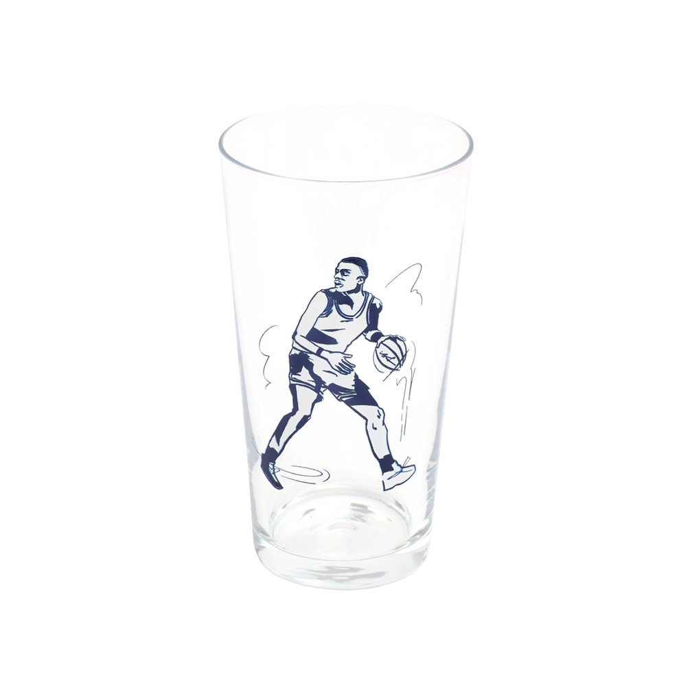 Basketball Pint Glass generous glassware, with a crisp silhouette and decorative details that stand out on the table; a practical choice for beer, soda, iced tea, or casual entertaining. Alternate product view shows more of the shape, finish, and design details.