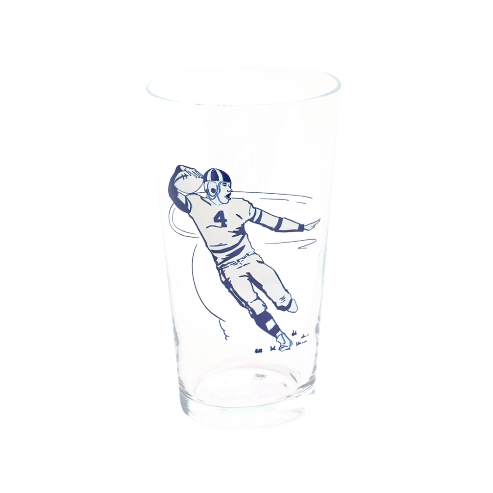 Football Pint Glass generous glassware, with a crisp silhouette and decorative details that stand out on the table; a practical choice for beer, soda, iced tea, or casual entertaining. Alternate product view shows more of the shape, finish, and design details.