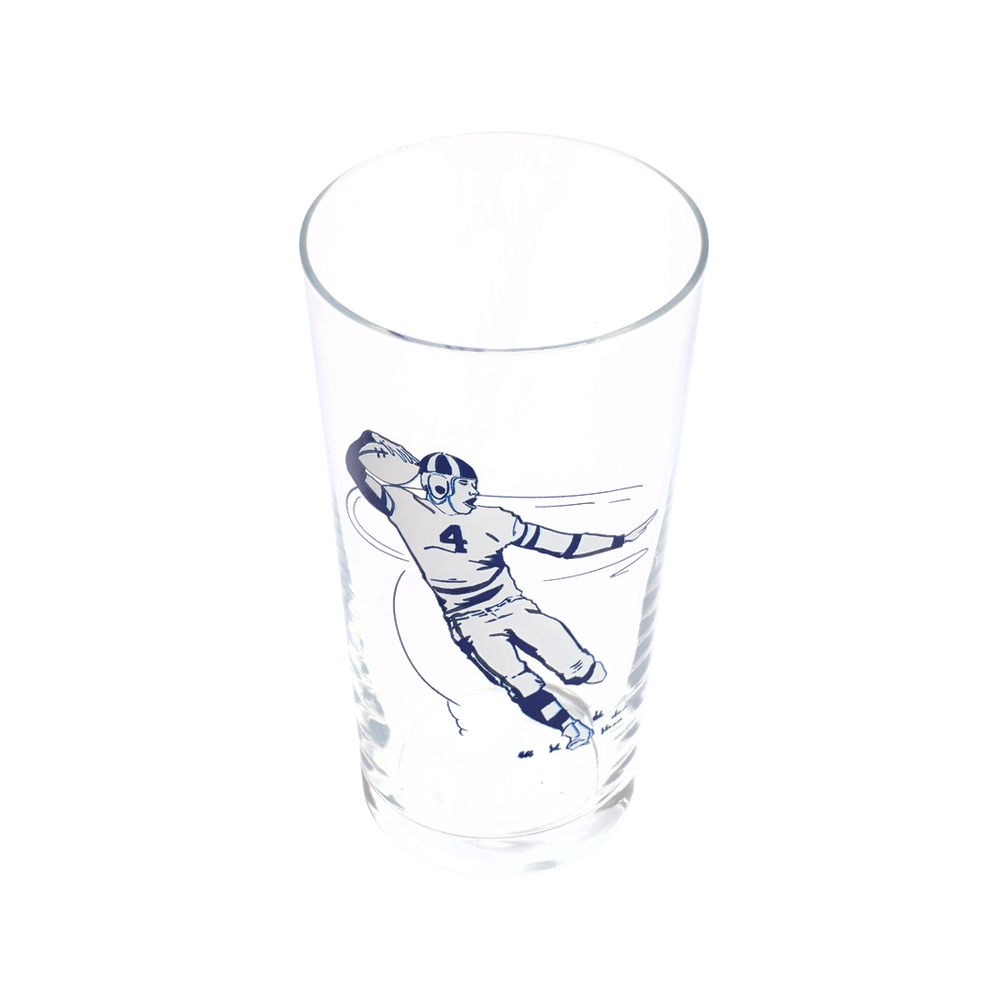Football Pint Glass generous glassware, with a crisp silhouette and decorative details that stand out on the table; a practical choice for beer, soda, iced tea, or casual entertaining. Additional view helps show the profile, scale, and decorative details.