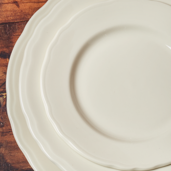 White ceramic plate on a wooden surface