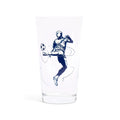 Clear pint glass with a navy illustration of a soccer player kicking a ball, side view