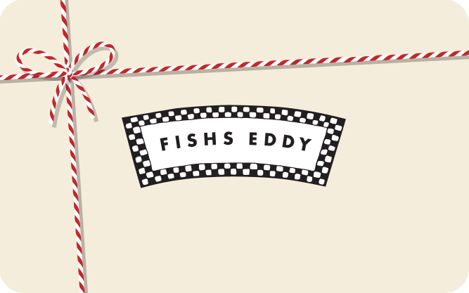 A physical gift card from Fishs Eddy, with a black and white checkered design and the brand name printed in the center, tied with a red and white striped ribbon.